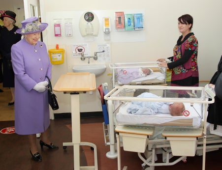 Queen visits babies.